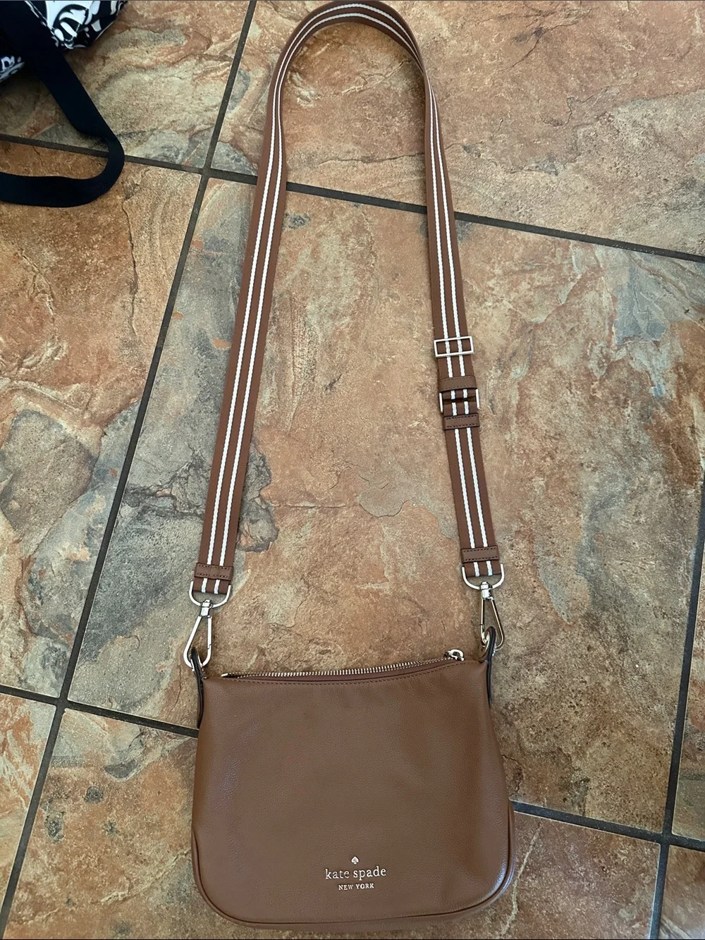 kate spade tan leather crossbody with striped shoulder strap